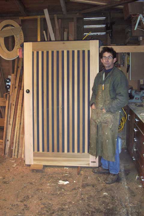 photo showing charles prowell building the picket gate #32. 1993