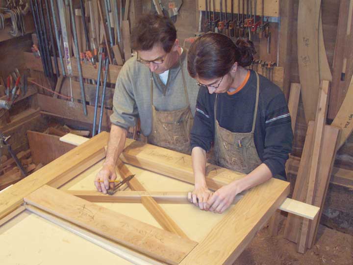 shop photo showing charles and ben prowell building wood gate #51