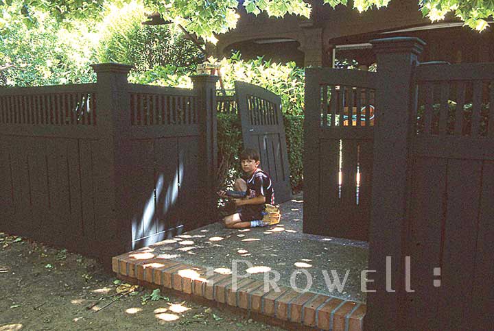 Ben prowell installing a wood fence panel in Marin County, CA