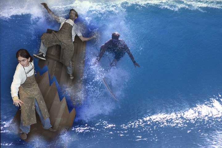 photograph showing charles and ben surfing the waves on a solid wood gate