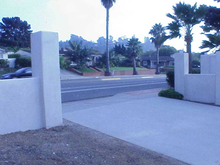 driveway gates with stucco columns