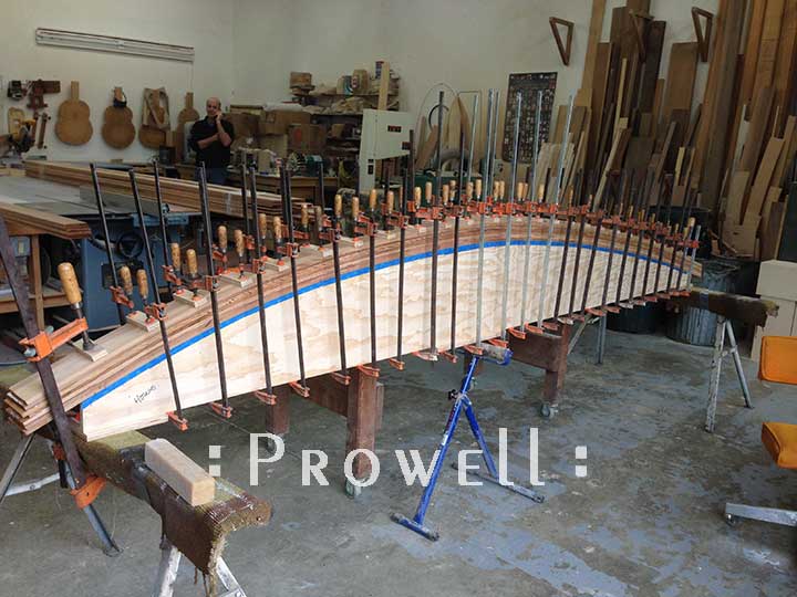 laminating arched beams for wood fence style #19-5 in Detroit. prowell woodworks
