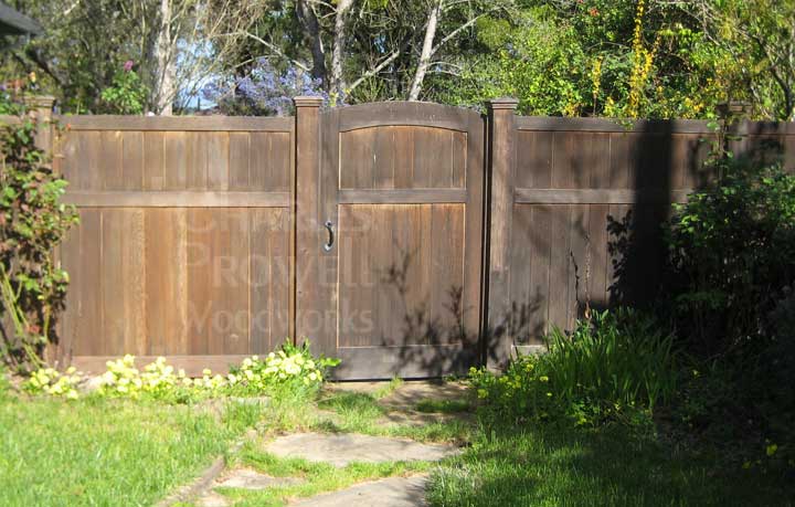 custom wood fence panels weathering to a natural gray