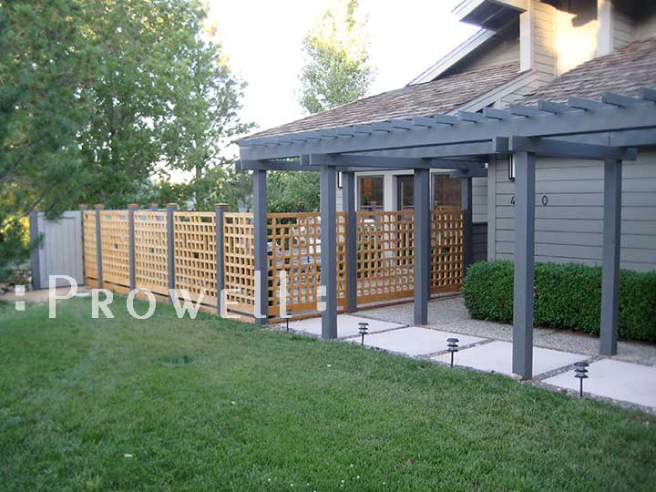 Open grid wood fence panels in Nevada