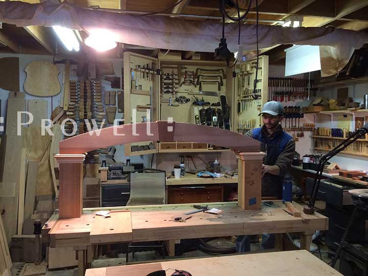 Ben Prowell building the arched wood arbor #9