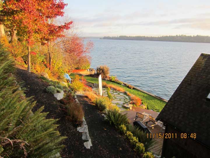 Site photo showing the landscape of Puget Sound, Washington for picket gate #113-1wood gates in Olympic Park, Washington