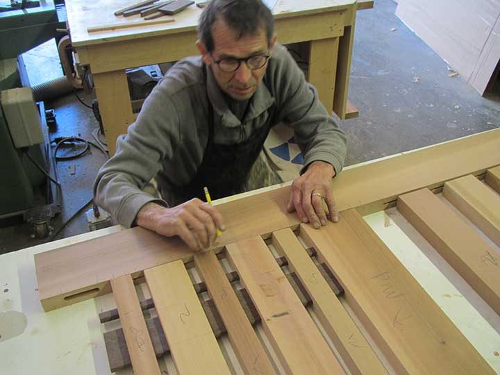 Shop photograph showing Charles building the wooden gate #115