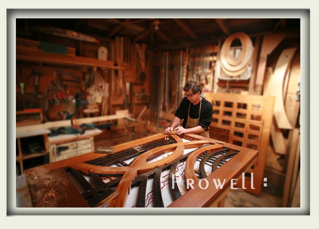 photograph in the shop sowing Charles working on the eccentric gate #200.