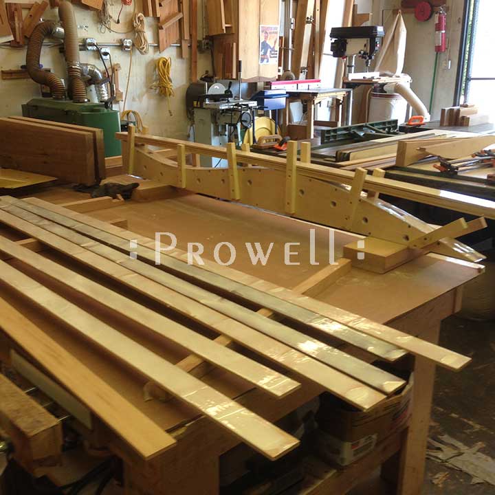 shop progress photograph showing the lamination forms for the modern fence gate #209