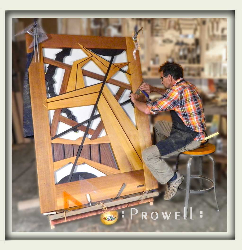 photograph showing charles prowell in the woodshop with the abstract gate design #210