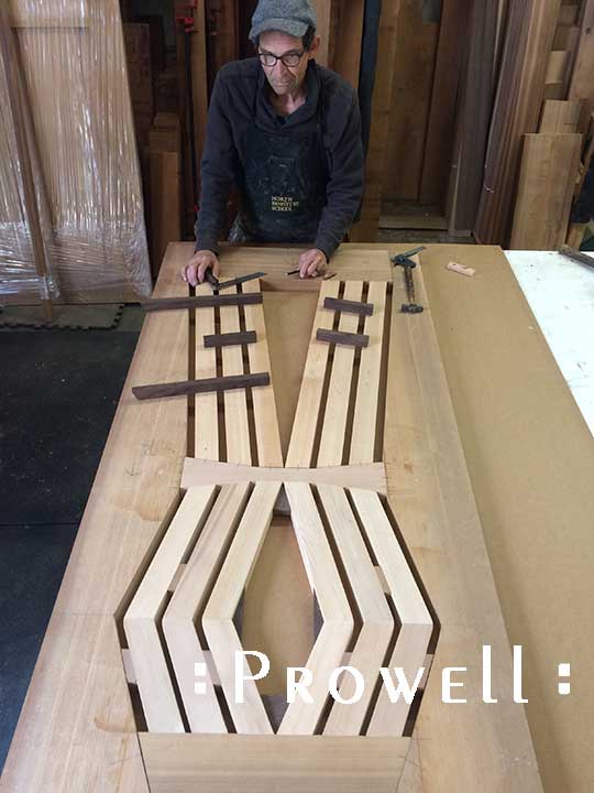 In-progress shop photograph of charles with the wood gate design 216