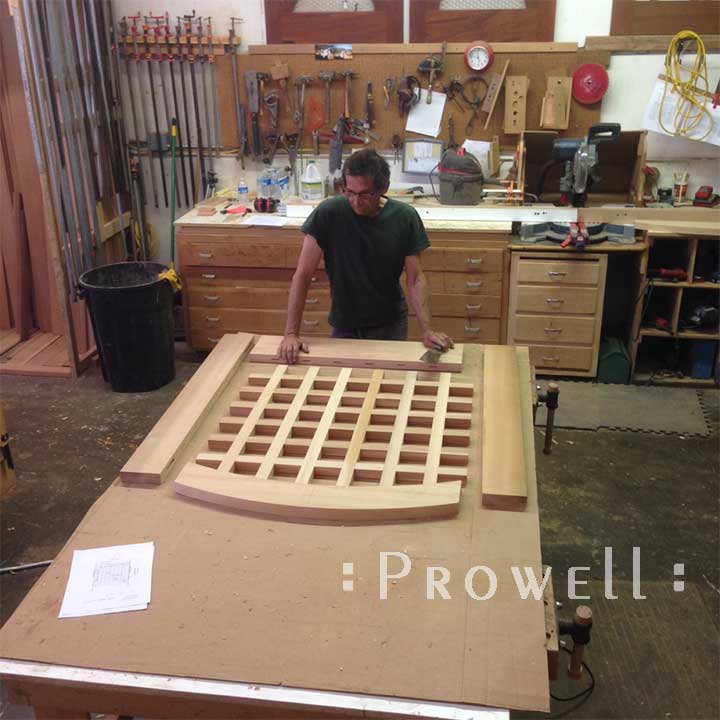 photograph showing Charles Prowell in the shop building the wood garden gate #27