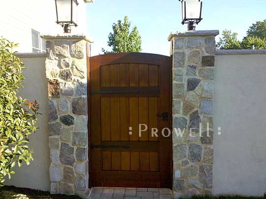photo with stone columns and garden gate #29-13 in Staten Island, NY