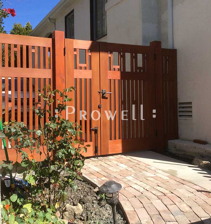 site photograph showing double off-set wood fence gate 38-7 with flanking fence panels in Berkeley, California