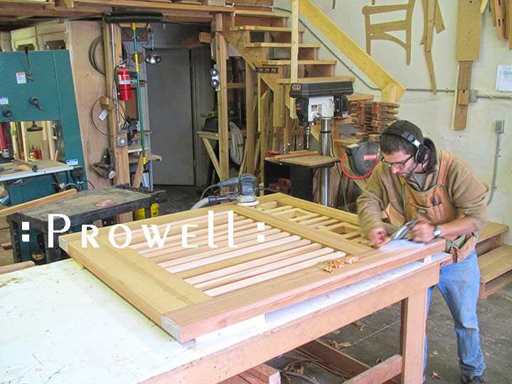 shop photo showing Ben prowell planing the craftsman wood gate #38