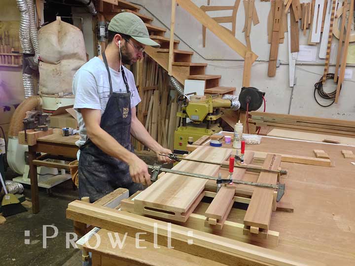 shop photo showing ben prowell gluing up gate 70