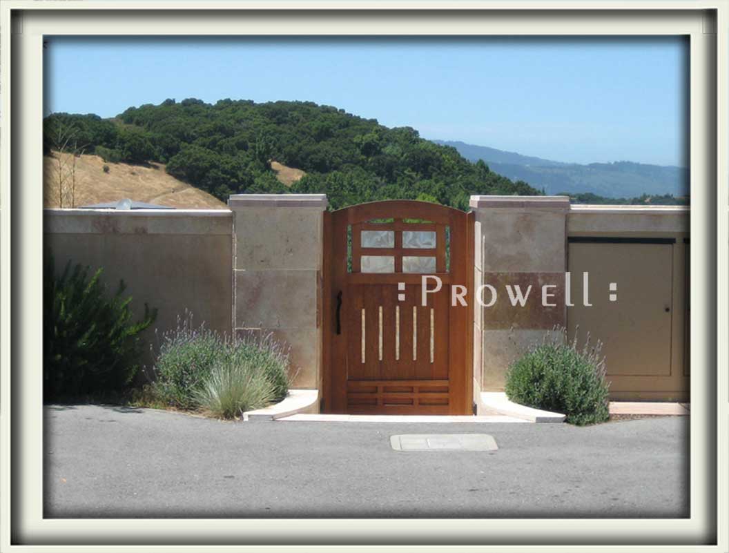 site photograph showing garden door #84with stone columns in Woodside, California