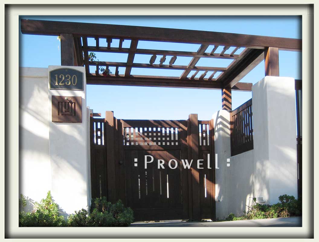 Site photograph showing cedar wood gates #94 with driveway gates and arbor in La Jolla, California