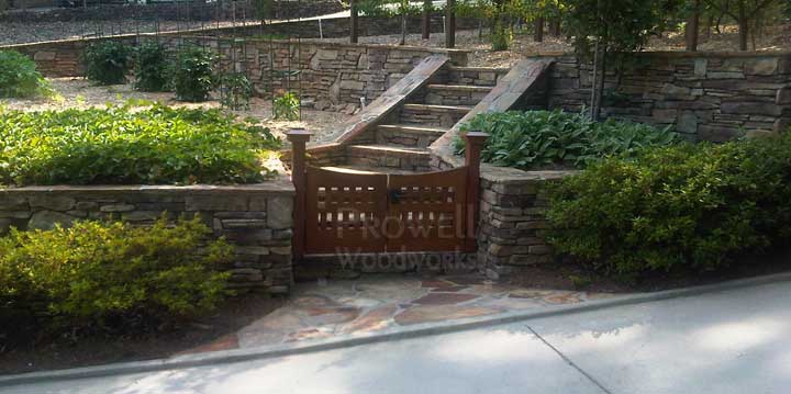 site photograph showing arched wooden gates #96-5 with stone walls in Atlanta, Georgia