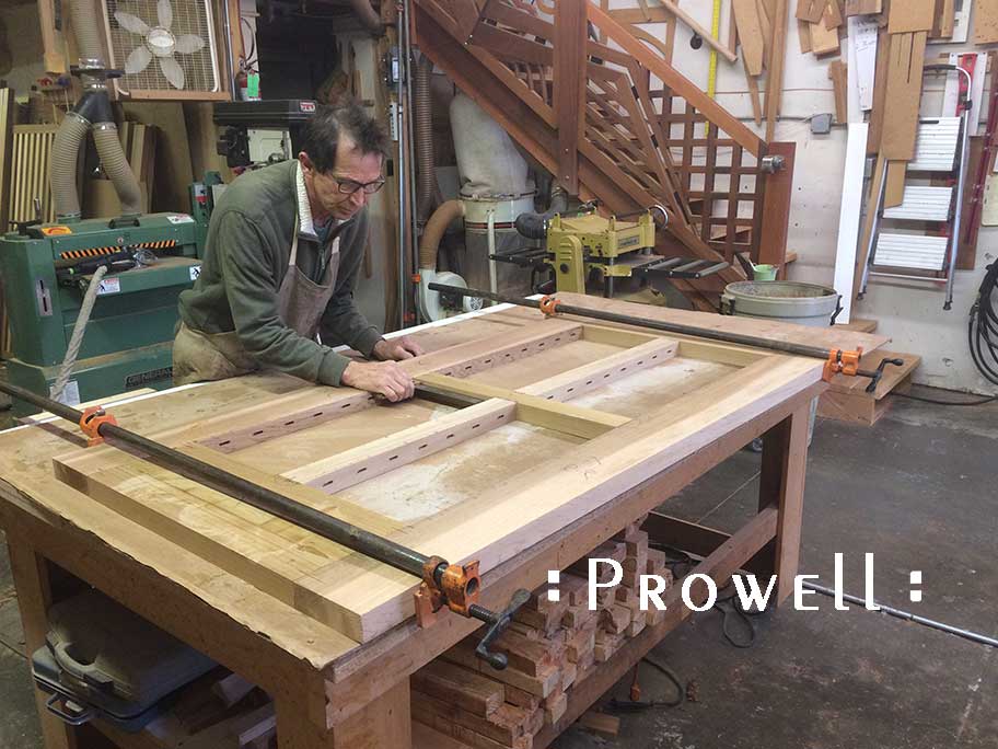 Photograph in the shop showing Charles building the wood gate design #99. 