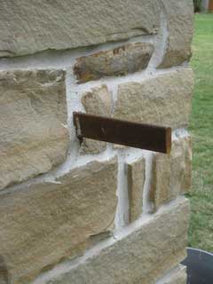 How to support a drive gate off stone columns