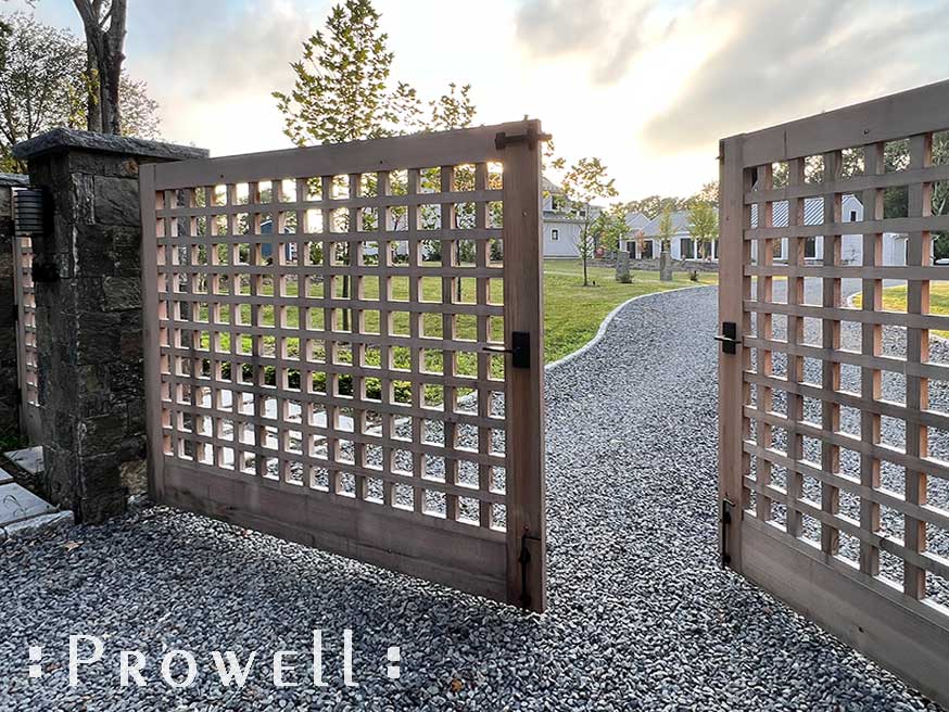 Open grid wooden driveway gates in Jamestown, Rhode Island