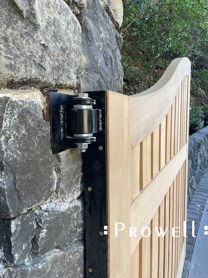 Hinge systems for hanging wood driveway gates